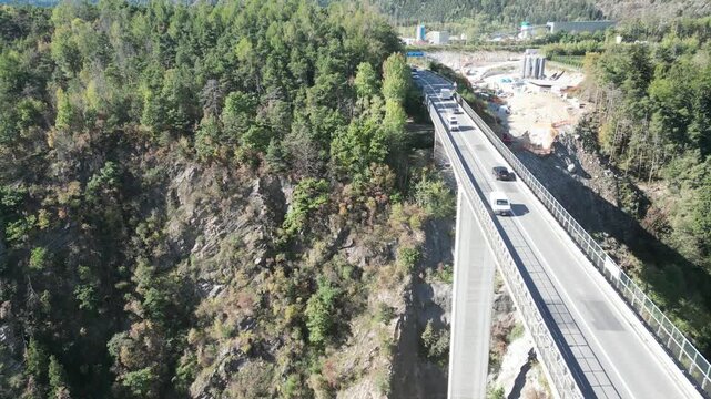 Ponte Riga near Varna and the A22, with the famous Brenner Base Tunnel construction site in the background, merging engineering and Alpine scenery.