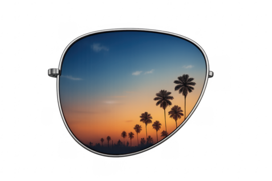Sunglasses lens reflecting tropical sunset with palm trees
