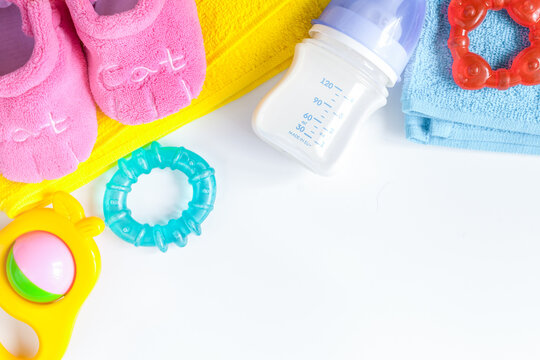 baby bottle with milk on white background top view - Powered by Adobe