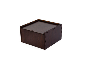 Wooden packing box for leather belt isolated on white background.