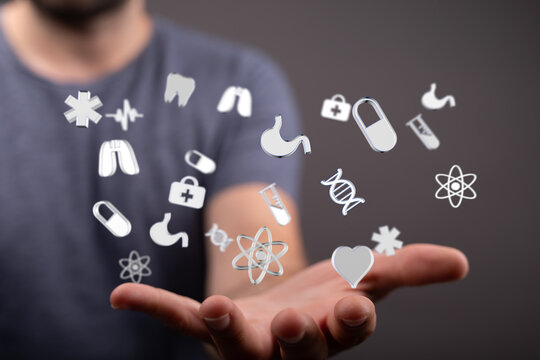 Man holding digital healthcare icons. Medical, health, technology, medicine, wellness.