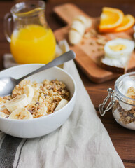 healthy breakfast bowl of yogurt with granola and eggs