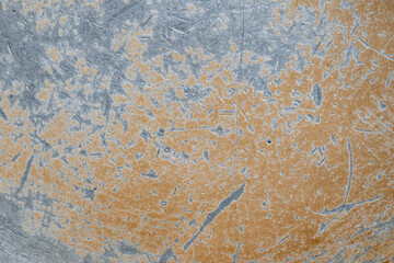 old aluminum sheet with burnt marks from the pan