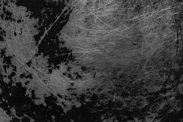 black old aluminum sheet with burnt marks from the pan