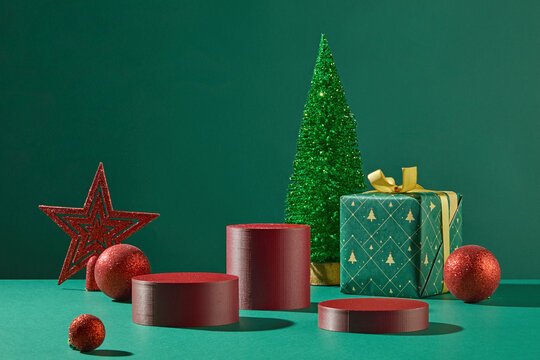 Festive scene featuring a red star, ornaments, and green trees on a clean background. Perfect layout for Christmas greeting design or banner use.