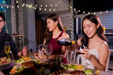 Wine glasses clinked as people celebrated the New Year and New Year's Eve parties.
