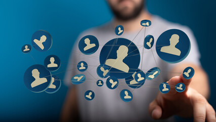 Digital network of people with a man's hand touching the virtual icons. Showing connection and digital resources.