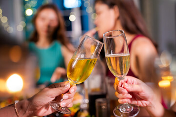  Wedding, couple at celebration party with friends and family, happy and smiling toasting champagne...