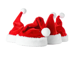 Four festive red velvet hats with white trim, and fluffy pom-poms arranged on black