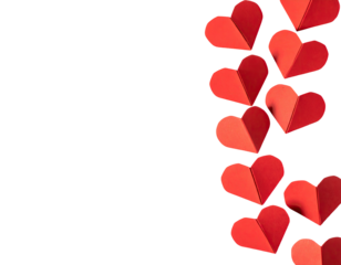 A vertical arrangement of folded paper hearts against a stark black background