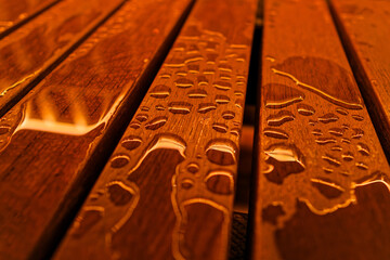 Raindrops on Warm Wooden Surface