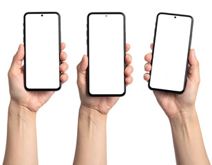 Three smartphones with blank white screens held by hands against a dark background