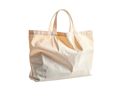 A beige cloth tote bag isolated on a transparent background, showcasing its handles