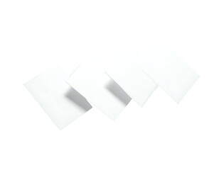 Four folded white squares in a diamond formation against a black background, with shadows