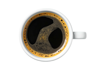 Overhead shot of a white ceramic cup brimming with dark coffee, foam visible