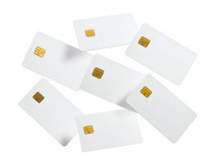 A scattered collection of blank white payment cards with embedded golden chips