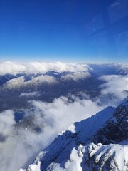 Snow covered mountain top in Austria. View of the Alps from the Zugspitze, the highest mountain in Germany
