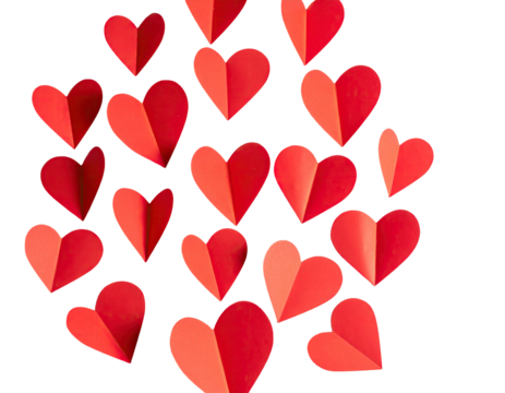 A cluster of folded red paper hearts against a black background, conveying love and affection