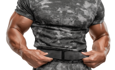 Muscular Man in Camo Shirt Adjusting Tactical Belt isolated on a transparent background