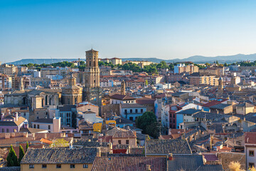 Fototapeta premium View of Tudela, a city in Navarre, Spain, at sunset, showing a mix of residential and historic buildings