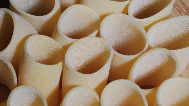 Italian pasta Paccheri, Cannelloni type of pasta in the shape of a very large tube, originating from Campania