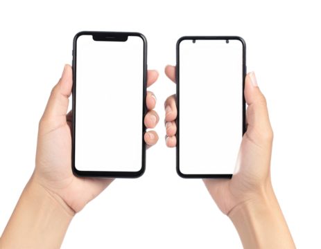 Hands holding two smartphones with blank white screens, isolated against a black background
