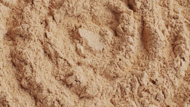 Ashwagandha Indian Ginseng Powder in White Bowl isolated on white background, superfood close up. 