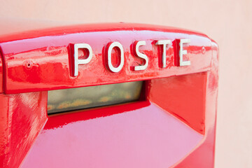 Old italian public red metal mailbox with italian Poste text