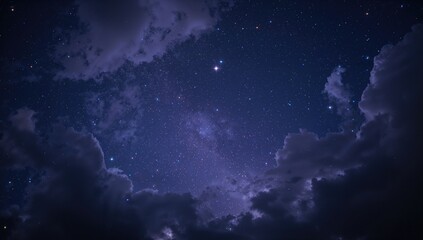 Starry night sky with clouds