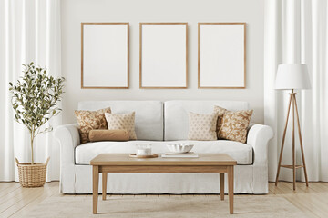 Home interior mockup three hanging vertical frames on the wall. Traditional living room design with slipcovered sofa, pillows, decorated coffee table, floor lamp and plant in basket. 3d rendering.
