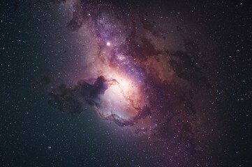 Fototapeta premium Cosmic explosion illuminating a vast star-filled nebula