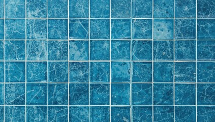 Close-up view of cracked stretch marks on glazed blue tiles with an abstract grid line pattern in cyan hues.
