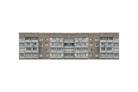 Four-storey old prefabricated apartment building with symmetrical facade is isolated.