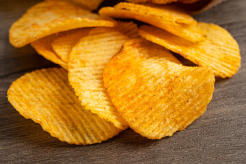 Potato chips , delicious BBQ seasoning spicy for crips, thin slice deep fried snack fast food.
