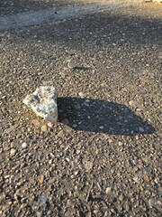 Stone texture background on asphalt 