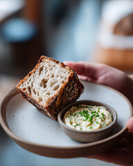 hand holding fork with spaghetti minimalist focus