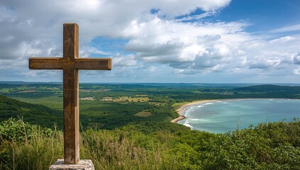 A towering cross rises above peaceful waters and vibrant green scenery beneath a sky dotted with clouds.