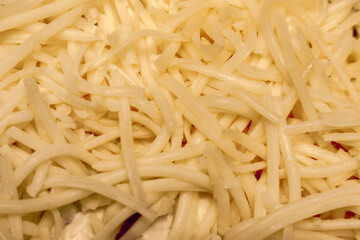 Chiffon cake with a lot of shredded cheese as a topping