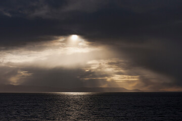 Dramatic skies across the Porsangerfjorden from Honningsvåg, Nordkapp, Finnmark, Northern Norway