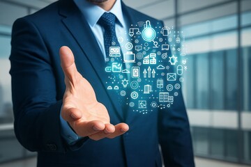 Businessman presenting virtual technology icons in his hand with blurred background