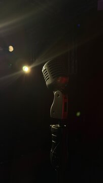microphone on stage with spotlight