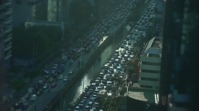 A busy urban traffic jam unfolds in a bustling cityscape with cars and people everywhere