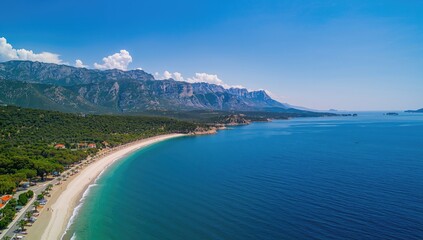 Aerial view of a coastal beach and shoreline in a Mediterranean region along the Adriatic Sea.