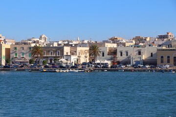 Naklejka premium Molfetta town sea view in Apulia, Italy. Molfetta fishing harbor waterfront.
