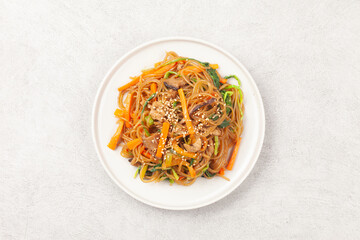 Japchae is a dish made by stir-frying vegetables, mushrooms, meat, and other ingredients and mixing them with boiled glass noodles.

