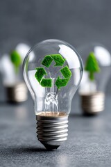 Light bulbs with green recycling symbols and a small tree inside, showcasing eco-friendly concepts, sustainability, and renewable energy in a creative arrangement