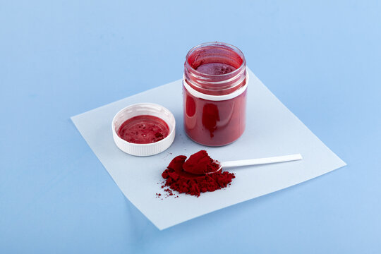 Red azo dye powder. Color index of 16035. Food additive E129. Allura Red AC used in some tattoo inks and is used in many products, such as cotton candy, soft drinks, candy