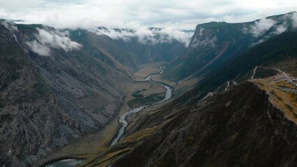 Chulyshman valley, altai republic, russia: winding river flowing through dramatic landscape. Media