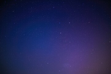 Obraz premium Abstract gradient backdrop adorned with stars