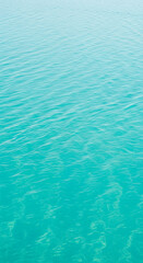 Obraz premium Aqua water texture image, showing gentle waves and subtle light reflections, representing serenity, peace, and calmness